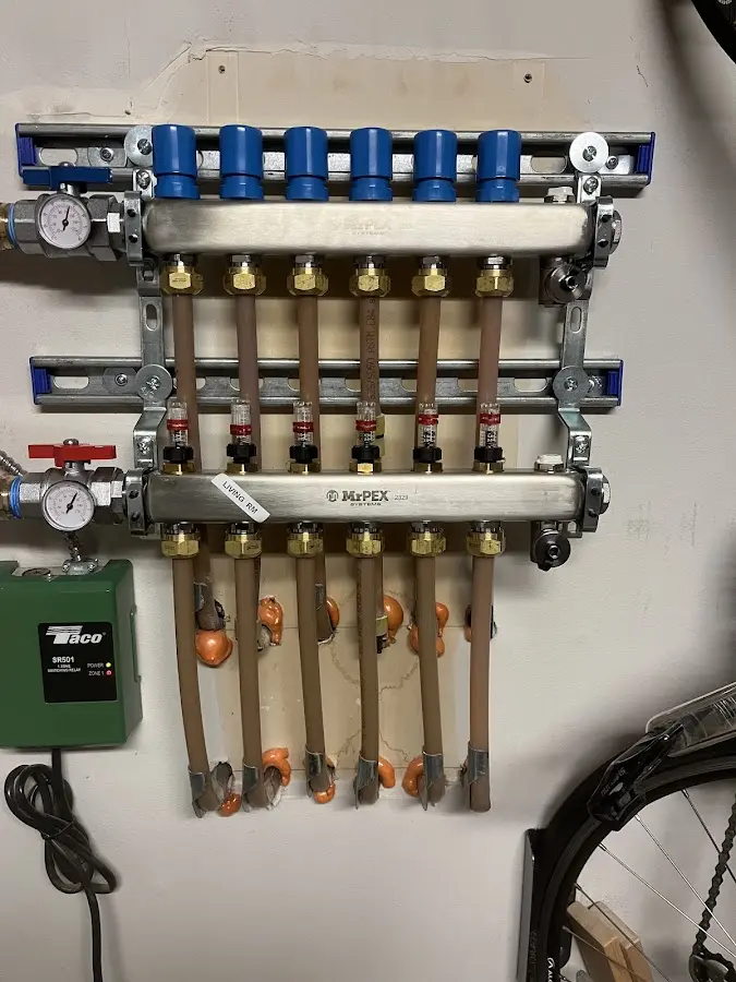 Plumber performing Gas Line Installation at a residential property in Holbrook